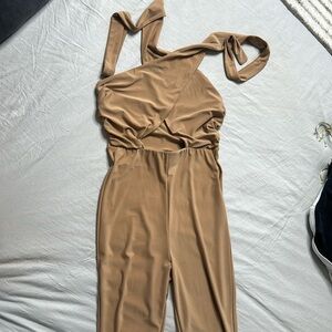 Halter jumpsuit with a high rise pant cut off.